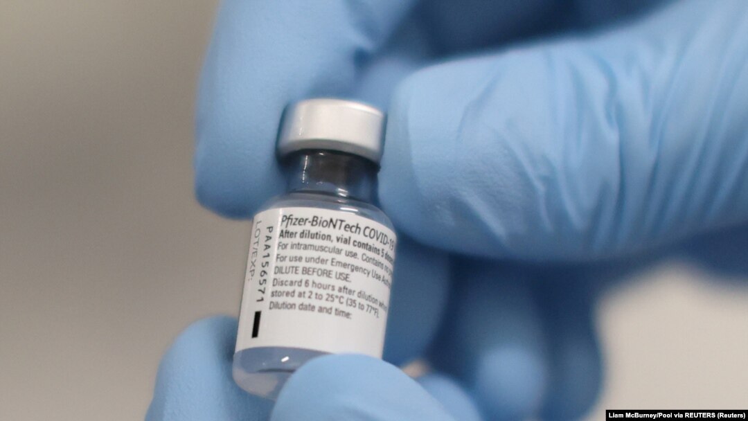 A vial of the Pfizer/BioNTech COVID-19 vaccine is seen ahead of being administered at the Royal Victoria Hospital, on the first day of the largest immunisation programme in the British history, in Belfast, Northern Ireland December 8, 2020. Liam McBurney/Pool via REUTERS