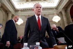 FILE - Attorney General-designate Sen. Jeff Sessions takes his seat on Capitol Hill in Washington, Jan. 10, 2017, after a break in his confirmation hearing before the Senate Judiciary Committee.