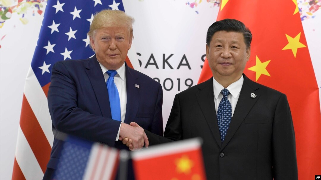 美國總統特朗普與中國國家主席習近平2019年6月在大阪召開的G20峰會上握手。