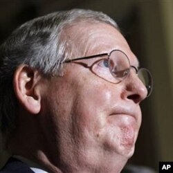 Senate Minority Leader Mitch McConnell talks with reporters on Capitol Hill in Washington (File Photo)