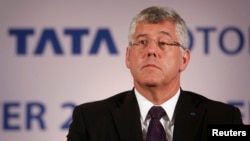 FILE - Karl Slym, managing director of Tata Motors, looks on during a news conference to announce their second quarter results in Mumbai, Nov. 8, 2013..