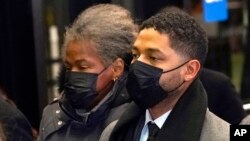 Actor Jussie Smollett, along with his mother, Janet, returns to the Leighton Criminal Courthouse,mDec. 9, 2021, in Chicago, after a jury reached a verdict in his trial. 