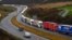 Trucks queue in Dover, England, Dec. 11, 2020. The U.K. left the EU on Jan. 31, but remains within the bloc's tariff-free single market and customs union until the end of the year. 