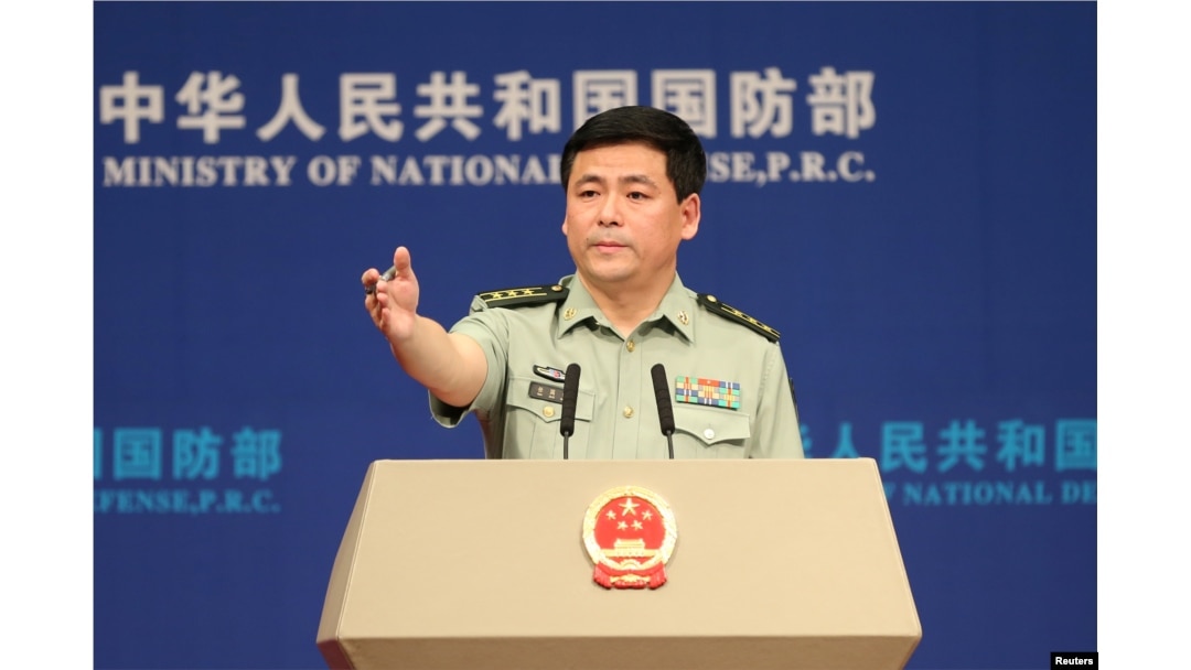 Chinese Defense Ministry spokesman Ren Guoqiang attends a news briefing in Beijing, China, May 25, 2017. Ren reiterated Thursday that China strictly enforced U.N. resolutions on North Korea.