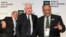 Newly-appointed World Anti-Doping Agency (WADA) president Craig Reedie, center, with his vice-president Makhenkesi Stofile, right, and the outgoing president John Fahey, in Johannesburg, Nov. 15, 2013.