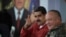 FILE - Venezuela's President Nicolas Maduro gestures during a TV show with National Constituent Assembly member Diosdado Cabello in Caracas, Venezuela, April 11, 2018. 
