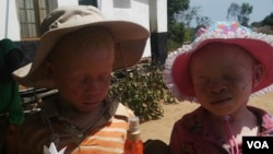 Children with albinism in Malawi are strongly advised not to walk unaccompanied by an elder, as abductions in the country have sparked widespread fear. (L. Masina/VOA)