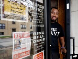 Lamar Johnson, a counselor for the church program B.R.A.V.E. Youth Leaders, stands at St. Sabina Church in Chicago, Nov. 9, 2018.