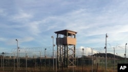 This Dec. 11, 2016 photo shows a guard tower at Camp Delta, one of the parts of the detention center at the U.S. Naval base at Guantanamo Bay, Cuba.