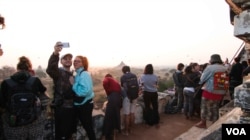 A couple pose for a selfie at Bagan, Myanmar. Climbing is permitted on selected monuments, such as Shwesandaw Pagoda. (Photo: John Owens for VOA)