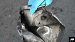 Remains of pressure cooker that FBI says was part of one of the bombs that exploded during the Boston Marathon, April 17, 2013. 