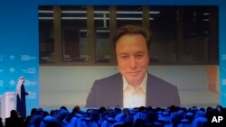Elon Musk virtually addresses the World Government Summit in Dubai, United Arab Emirates, Wednesday, Feb. 15, 2023.