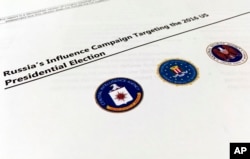 A part of the declassified version Intelligence Community Assessment on Russia's efforts to interfere with the U.S. political process is photographed in Washington, Jan. 6, 2017.