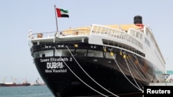 The Queen Elizabeth II cruise ship, launched as a hotel, is seen at Rashid port in Dubai, UAE, April 18, 2018. 