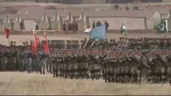 Pakistani and other troops stand in formation during joint military exercises of the Shanghai Cooperation Organization (SCO) in Russia's Orenburg region, in an image from video released by Pakistan Army’s media wing ISPR.