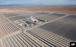 FILE - An aerial view of the Noor 1 solar plant in central Morocco, Feb.4, 2016.