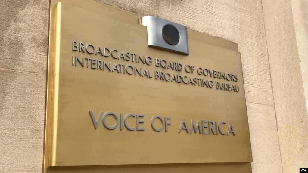 A Voice of America sign is seen at the entrance to VOA's headquarters in Washington, D.C.