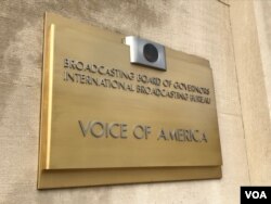 A Voice of America sign is seen at the entrance to VOA's headquarters in Washington, D.C.