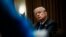 President Donald Trump pauses during a meeting in the Cabinet Room of the White House, in Washington, Feb. 28, 2018, with members of Congress to discuss school and community safety. 