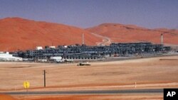 FILE - Industrial plant strips natural gas from crude oil at Saudi Aramco's Shaybah oil field, Shaybah, Saudi Arabia.