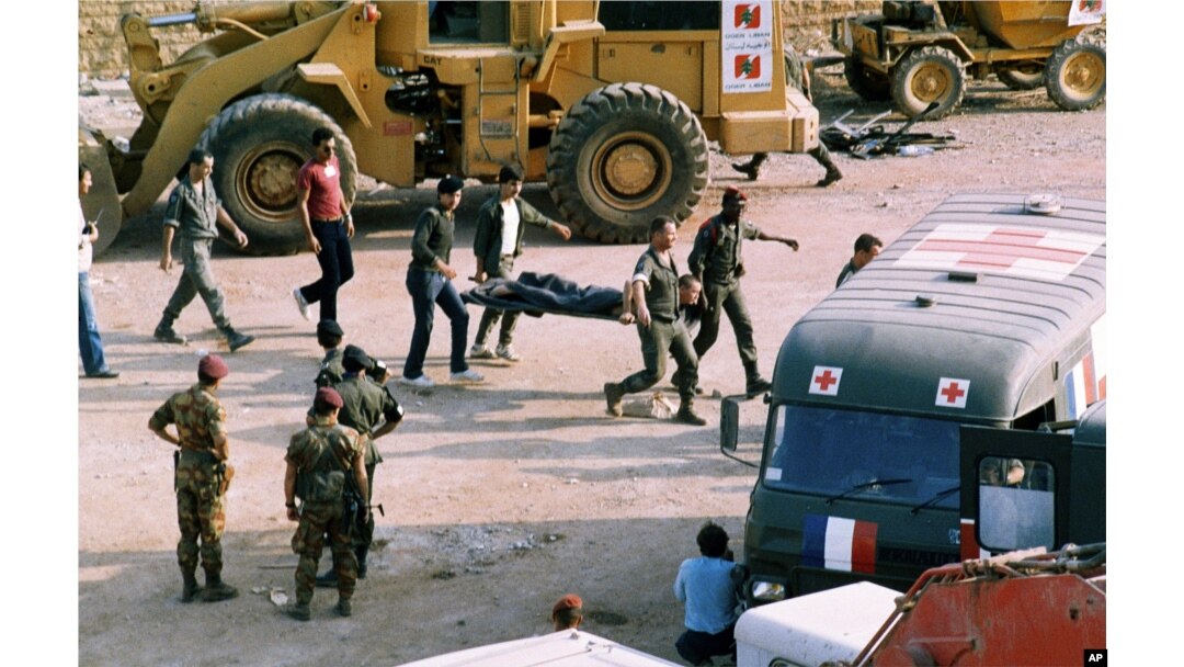 FILE - The scene at the U.S. Marine base near Beirut airport, Lebanon, following a suicide truck blast that destroyed the base and caused a huge death toll, Oct. 23, 1983.