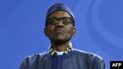 Le président nigérian Muhammadu Buhari lors d'une conférence de presse à Berlin, en Allemagne, le 14 octobre 2016.