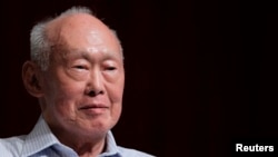 FILE - Former Singapore Prime Minister Lee Kuan Yew (LKY) smiles as he attends the LKY School of Public Policy 7th anniversary dialogue session in Singapore September 14, 2011. 