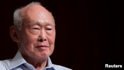 FILE - Former Singapore Prime Minister Lee Kuan Yew (LKY) smiles as he attends the LKY School of Public Policy 7th anniversary dialogue session in Singapore September 14, 2011. 