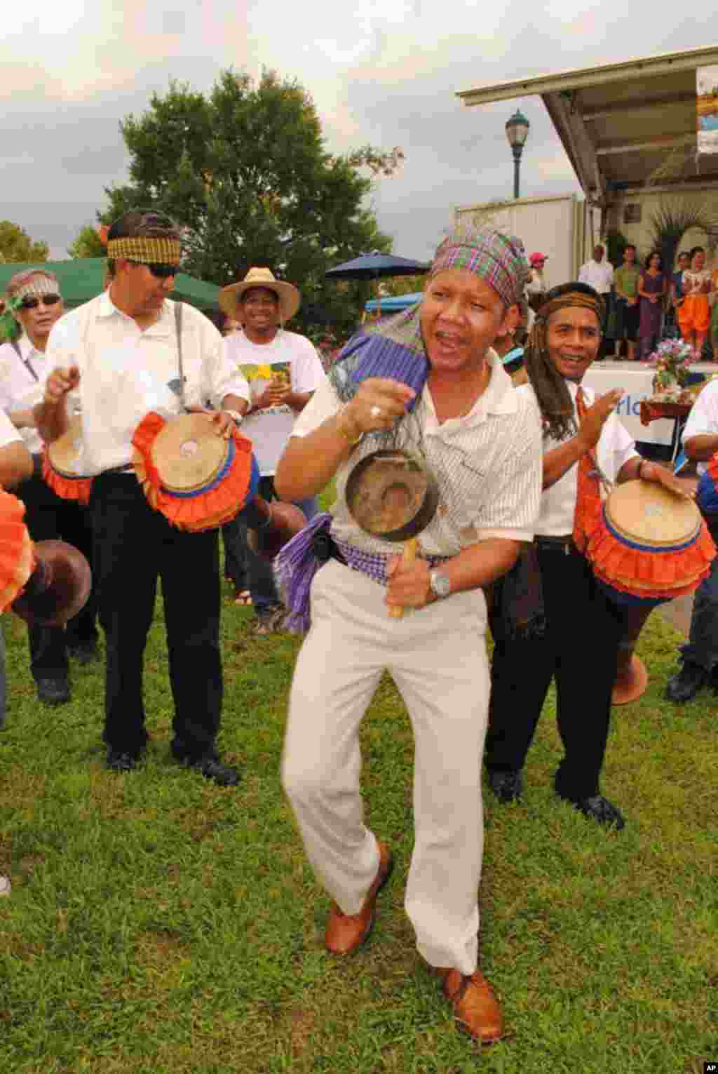 Cambodian participants celebrate Chhaiyam (ឆៃយ៉ាំ), a traditional performance that accompany many cultural and religious events.