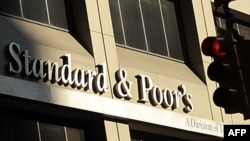Standard’s and Poors İspanya’nın Uzun Vadeli Kredi Notunu Düşürdü