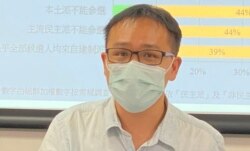 香港伍伦贡学院社会科学院助理教授李敏刚表示，就算有声称中间派的候选人参与12月的立法会选举， 如果这些候选人最终没有自由度提出政纲，估计对推高推票率作用不大。 (美国之音 汤惠芸)