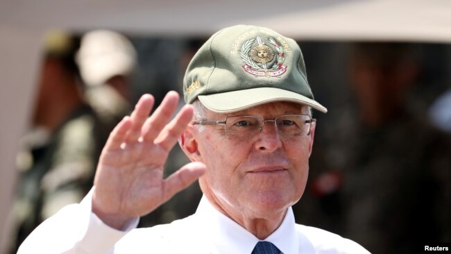 Peru's then-president, Pedro Pablo Kuczynski, participates in a military event at Rimac army headquarters in Lima, March 20, 2018.