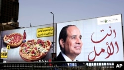 An election billboard for Egyptian President Abdel-Fattah el-Sissi, with Arabic that reads, "you are the hope," in Cairo, Egypt, March 19, 2018. Egyptians on social media are mocking the ubiquitous banners of el-Sissi raised ahead of this month’s election.