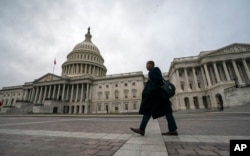 The U.S. Capitol is seen as the partial government shutdown lurches into a third week with President Donald Trump standing firm in his border wall funding demands, in Washington, Jan. 7, 2019.