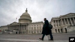 The U.S. Capitol is seen as the partial government shutdown lurches into a third week with President Donald Trump standing firm in his border wall funding demands, in Washington, Jan. 7, 2019.