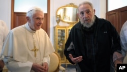 In this picture made available by the Vatican newspaper Osservatore Romano, Pope Benedict XVI meets with Fidel Castro in Havana, Cuba, Wednesday, March 28, 2012. 
