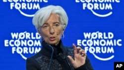 FILE - Managing Director of the International Monetary Fund, Christine Lagarde, speaks during a panel "The Global Economic Outlook" at the World Economic Forum in Davos, Switzerland, Jan. 23, 2016. 