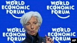 Managing Director of the International Monetary Fund, Christine Lagarde, speaks during a panel "The Global Economic Outlook" at the World Economic Forum in Davos, Switzerland, Jan. 23, 2016. 