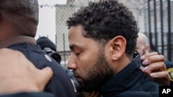 'Empire' actor Jussie Smollett leaves Cook County jail following his release, Feb. 21, 2019, in Chicago.