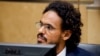 Ahmad Al Mahdi Al Faqi assis au tribunal lors de sa comparution initiale devant la Cour pénale internationale à La Haye, Pays-Bas, le 30 septembre 2015. (AP Photo/Robin van Lonkhuijsen)
