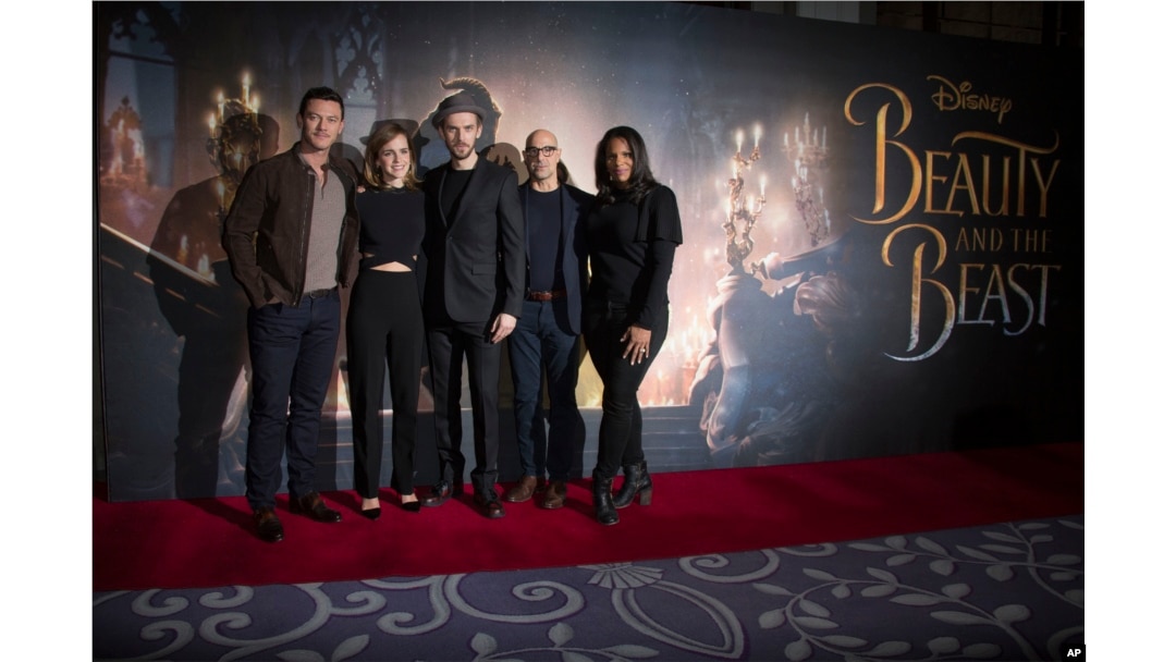 Actors from left, Luke Evans, Emma Watson, Dan Stevens, Stanley Tucci and Audra McDonald pose for photographers during a photo call for the Beauty And The Beast Premiere, in London, Feb. 24, 2017.