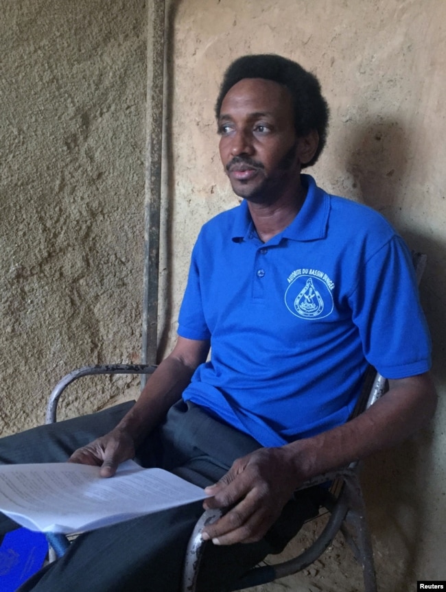Boubacar Diallo, president of the livestock breeders association of north Tillaberi on the Mali border, goes through a list of more than 300 Fulani herders killed by Tuareg raiders in the lawless region, during an interview with Reuters in Niamey, Niger,