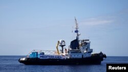 FILE - The Italian-flagged rescue vessel 'Mare Jonio' sails as it takes part in the "Mediterranea - Saving Humans" project in the central Mediterranean Sea, Oct. 6, 2018.