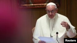 FILE - Pope Francis speaks during a synodal meeting at the Vatican, Oct. 3, 2018. North Korean leader Kim Jong Un is formally inviting Pope Francis to visit Pyongyang.