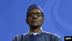 Le président nigérian Muhammadu Buhari lors d'une conférence de presse à Berlin, en Allemagne, le 14 octobre 2016.