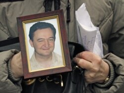 FILE - Sergei Magnitsky publicly disclosed a $230 million fraud scheme allegedly run by senior Russian officials. He died in 2009 after 11 months in prison.
