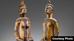 The auction of two wooden Igbo figures from Nigeria on June 29, 2020, has prompted new calls for repatriation of African artifacts. (Courtesy Christie’s)