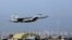 FILE - A U.S. Air Force F-15 fighter jet takes off from Incirlik Air Base, near Adana, Turkey, Dec. 15, 2015.