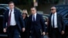 Hunter Biden, center, and his wife Melissa Cohen Biden, arrive at federal court for jury selection for his trial on felony tax charges, Sept. 5, 2024, in Los Angeles.