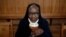 Benedictine Sister Gertrude drinks a "Maredret" beer in Anhee, Belgium, Dec. 8, 2021.